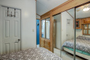 9-10-Main-Level-Bedroom-1-2.jpg